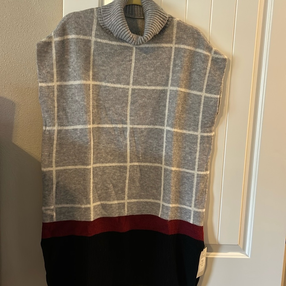 Cowl neck tunic length vest.